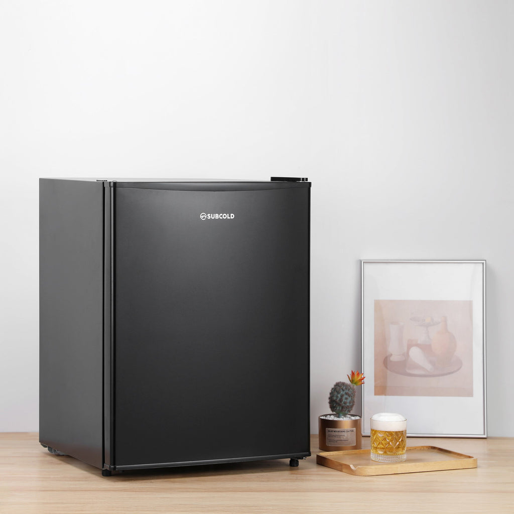 Black mini freezer with closed door and Subcold logo