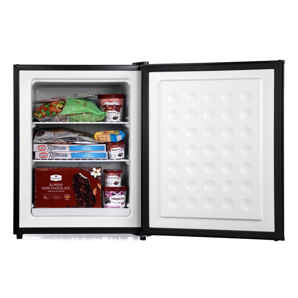 Black mini freezer with open door, stocked interior shelves and white panel