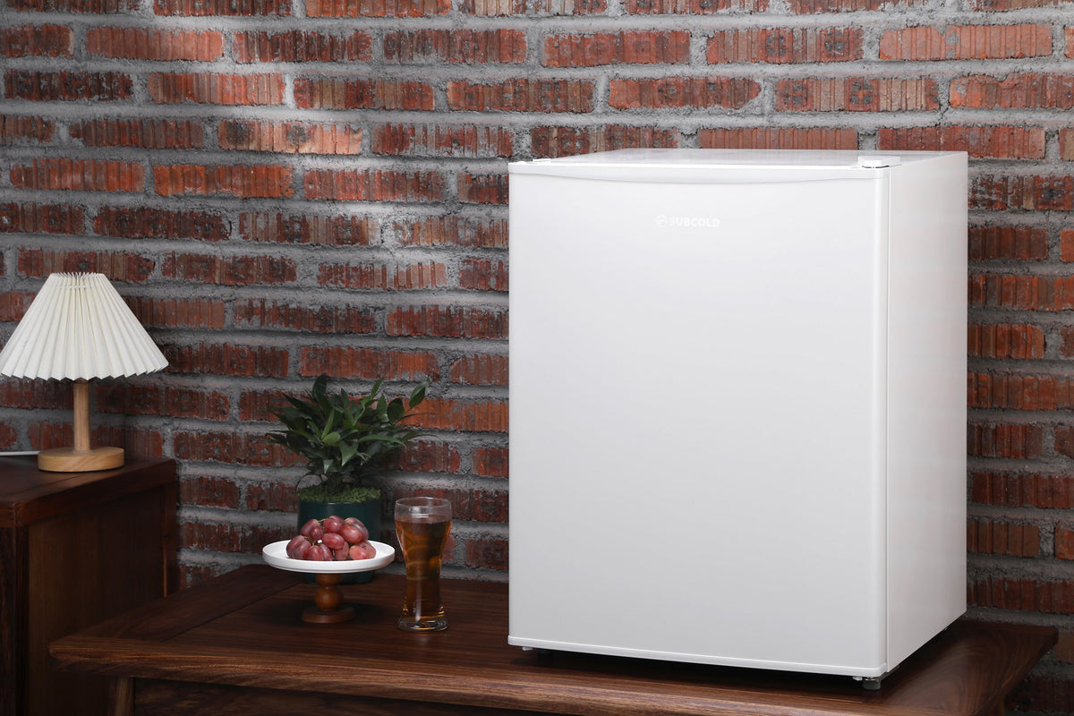 White mini freezer cabinet with closed door