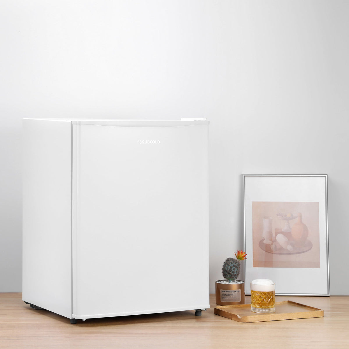 White mini freezer with closed door