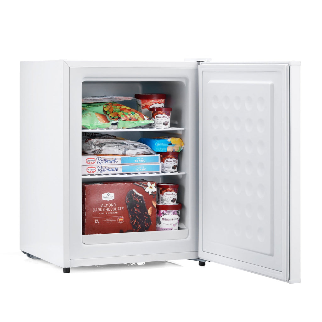 White mini freezer with open door, food packages on interior shelves