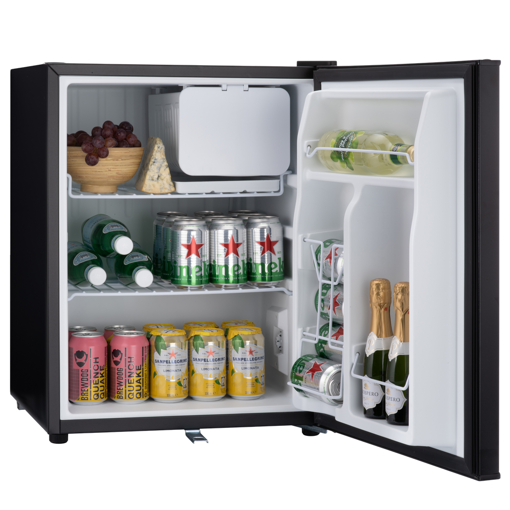 Black table-top fridge open with stocked interior shelves and door bottle holder