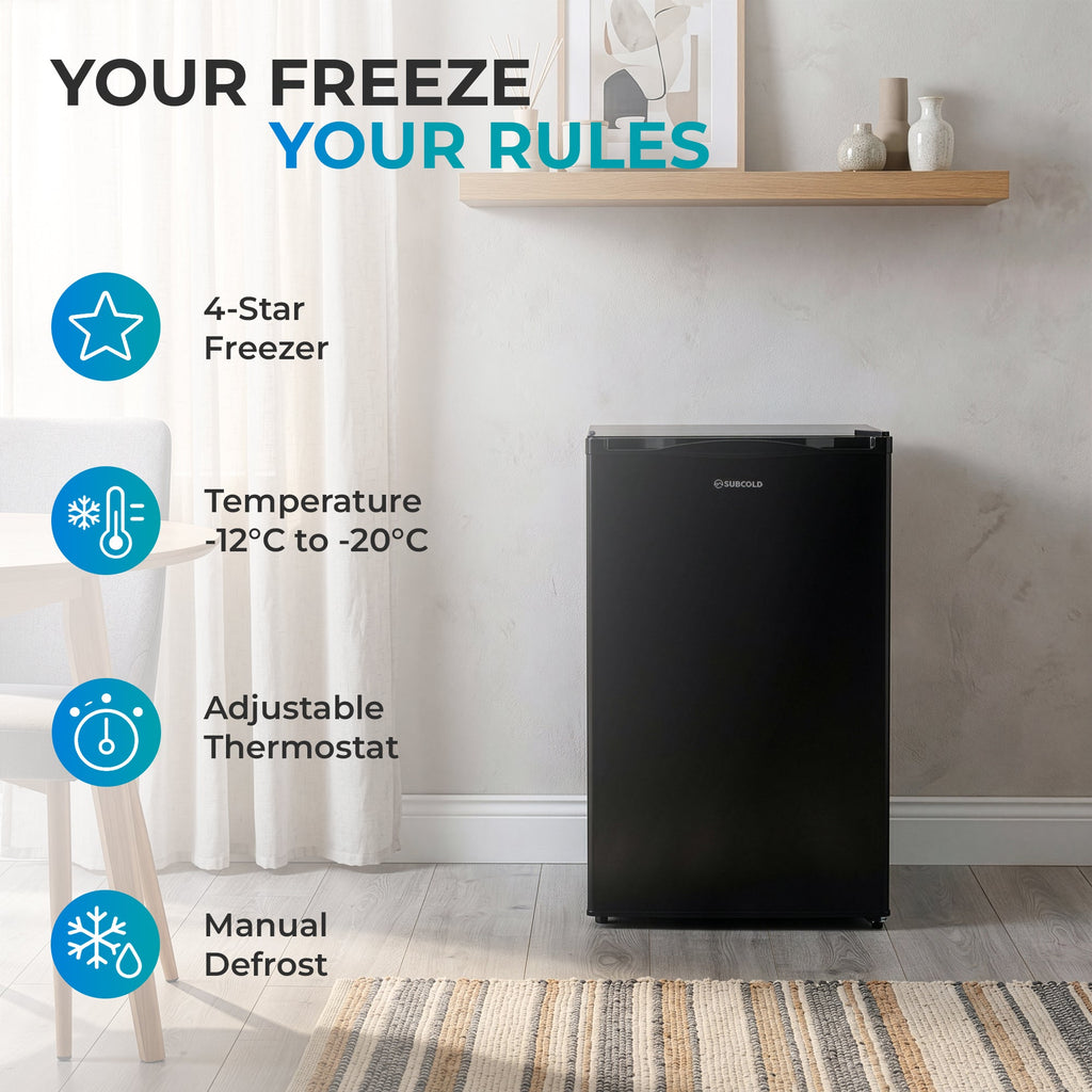 Black under-counter freezer standing upright with front door closed