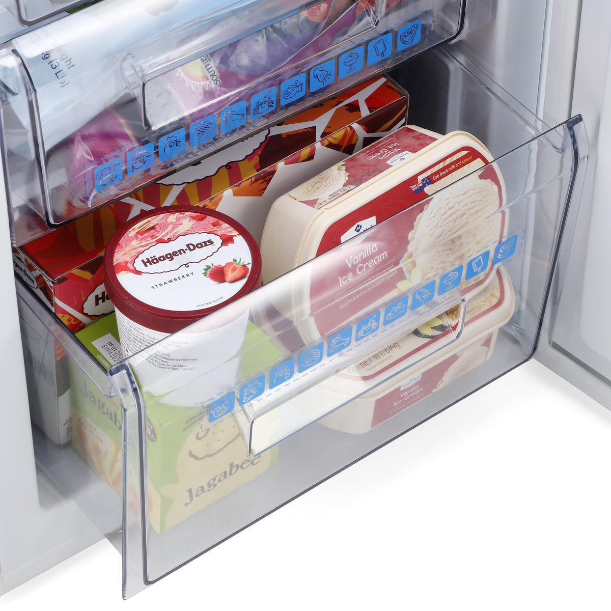 White under-counter freezer with door open, showing internal shelves and drawers.