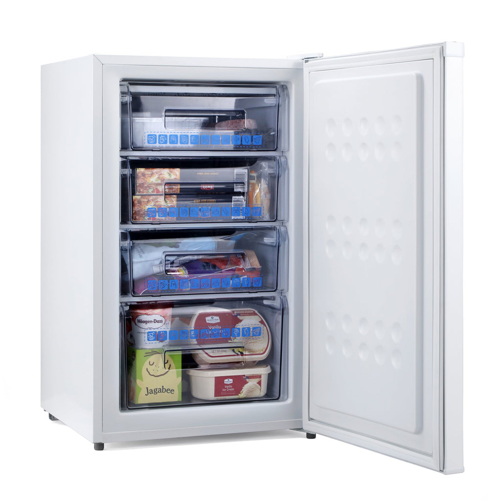 White under-counter freezer with door open, showing interior shelves and drawers.