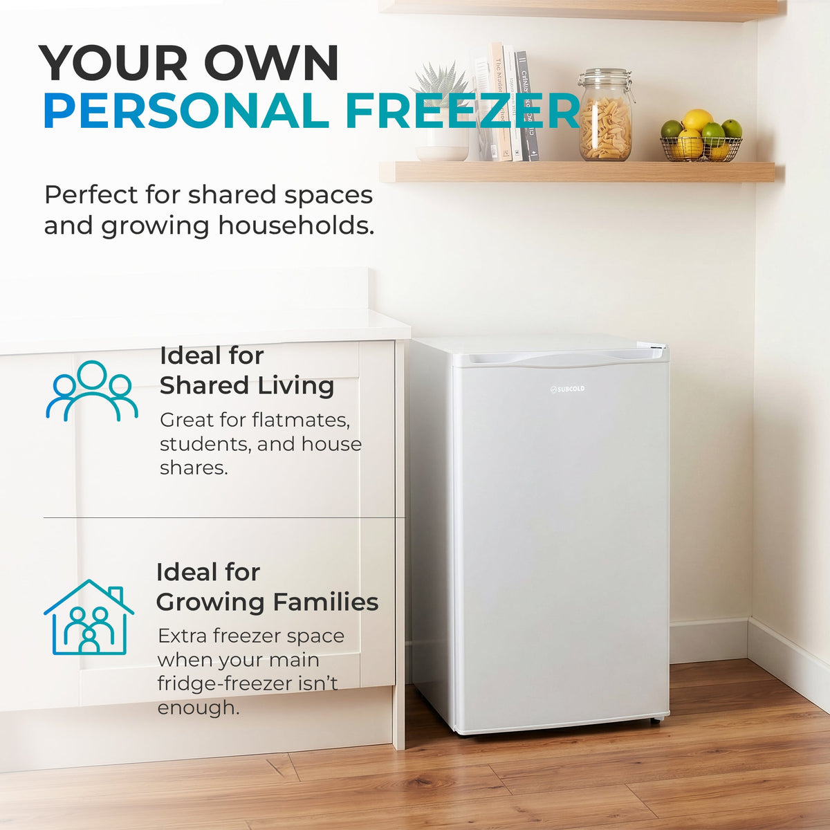 White under-counter freezer in a compact room, door closed, front view.