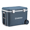 Blue portable cool box with white lid, silver latches, and four rolling wheels