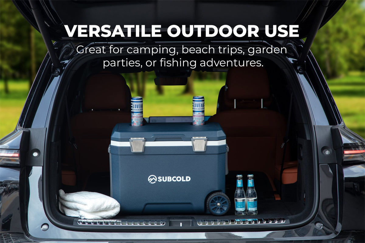 Blue cool box with open lid showing interior storage and drinks bottles