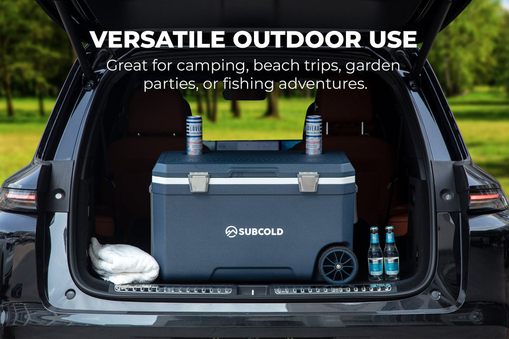 Blue cool box with open lid, interior packing space, and two side latches
