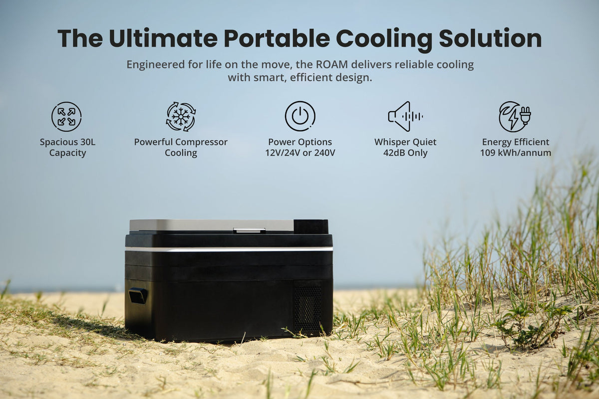 Black portable car fridge with raised lid and silver trim for on-the-go cooling.