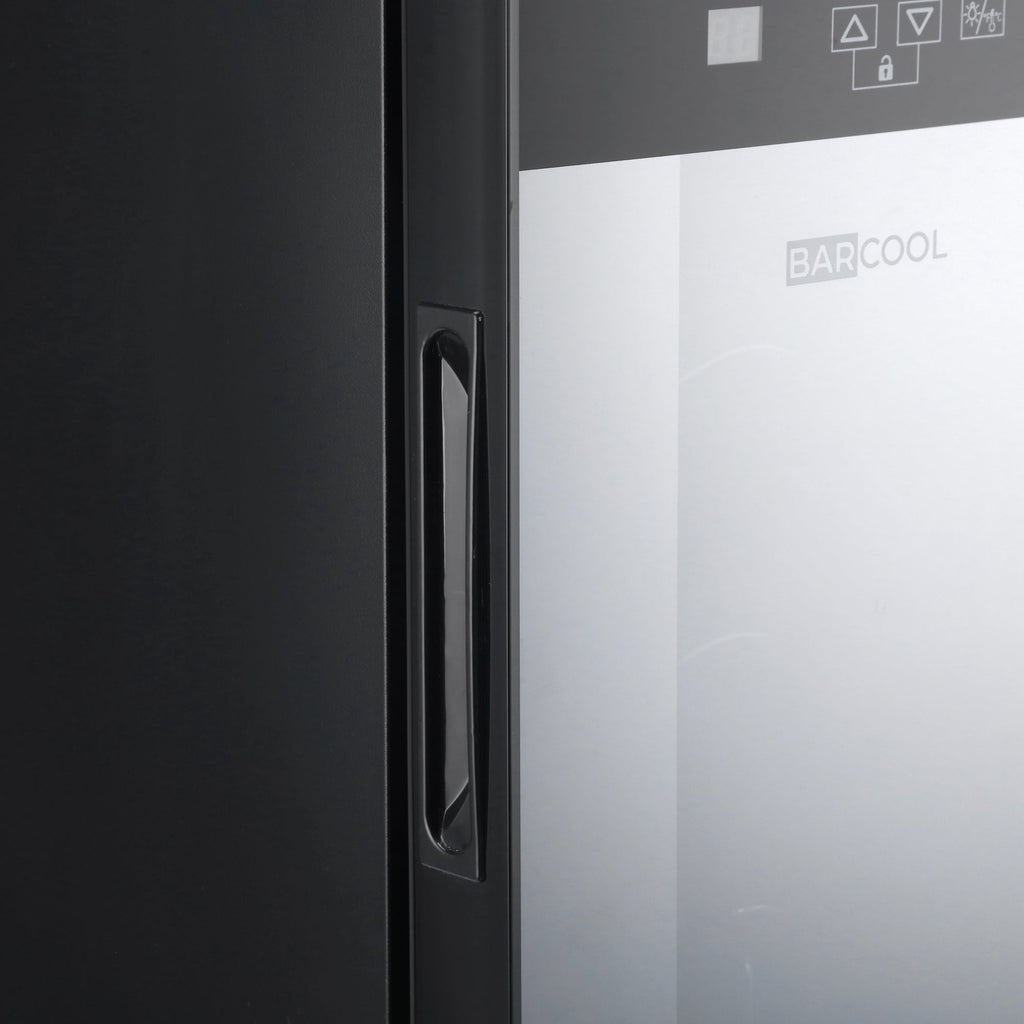 Slim wine cooler side with recessed vertical handle on black cabinet