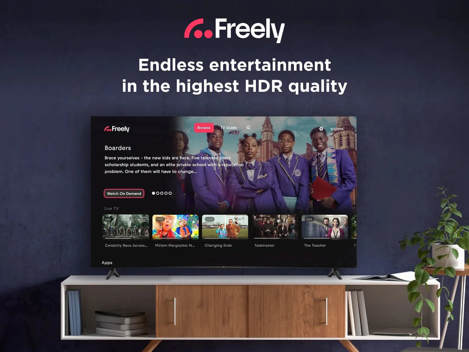 Black QLED TV on a wooden media stand showing streaming content