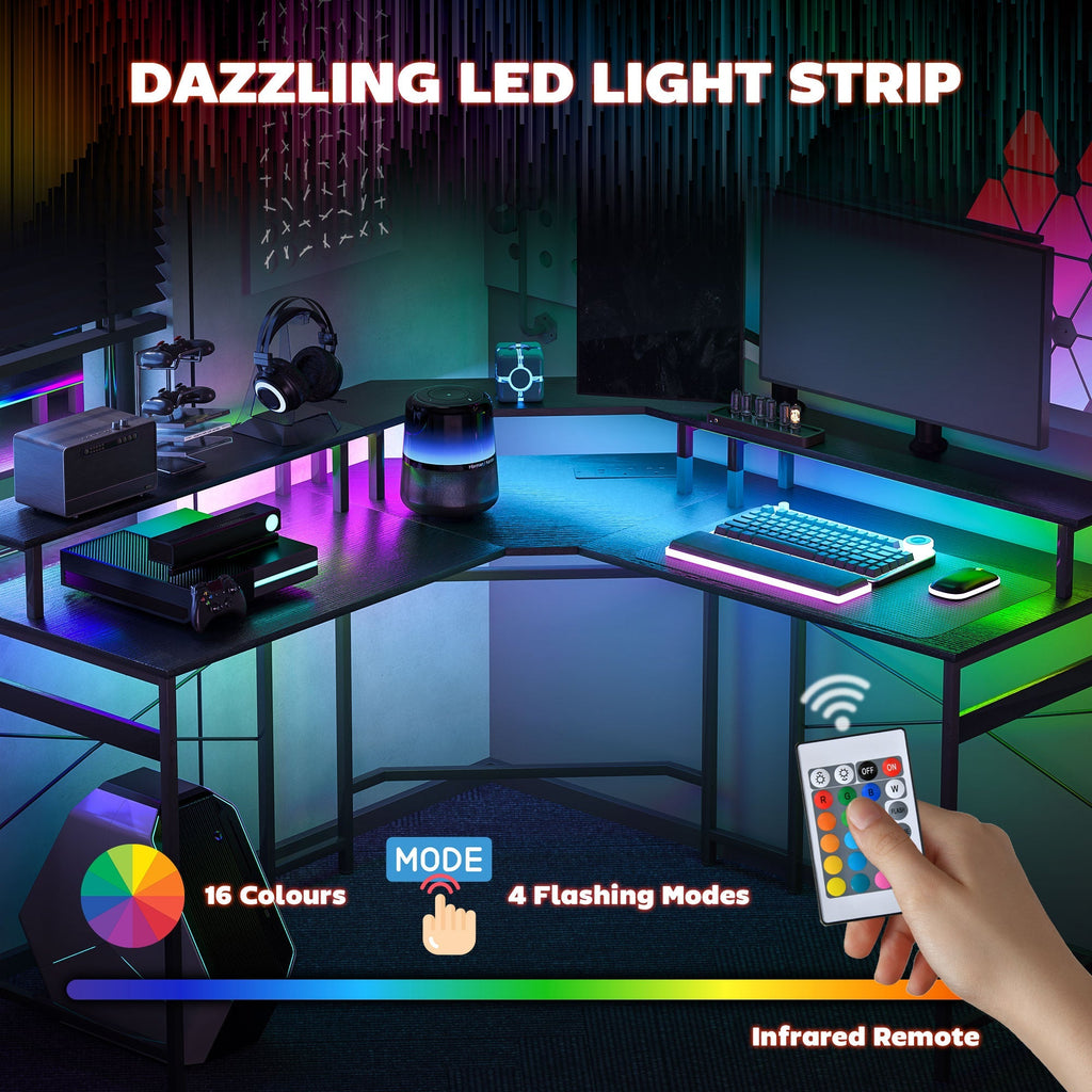 Black L-shaped desk with multicolor LED lighting strip and infrared remote