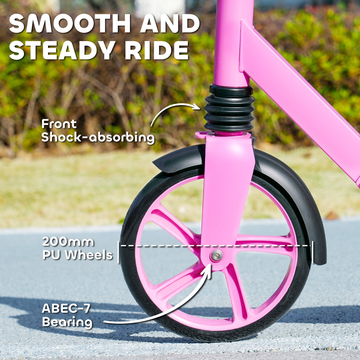 Pink front wheel with fork, fender, and shock-absorbing suspension