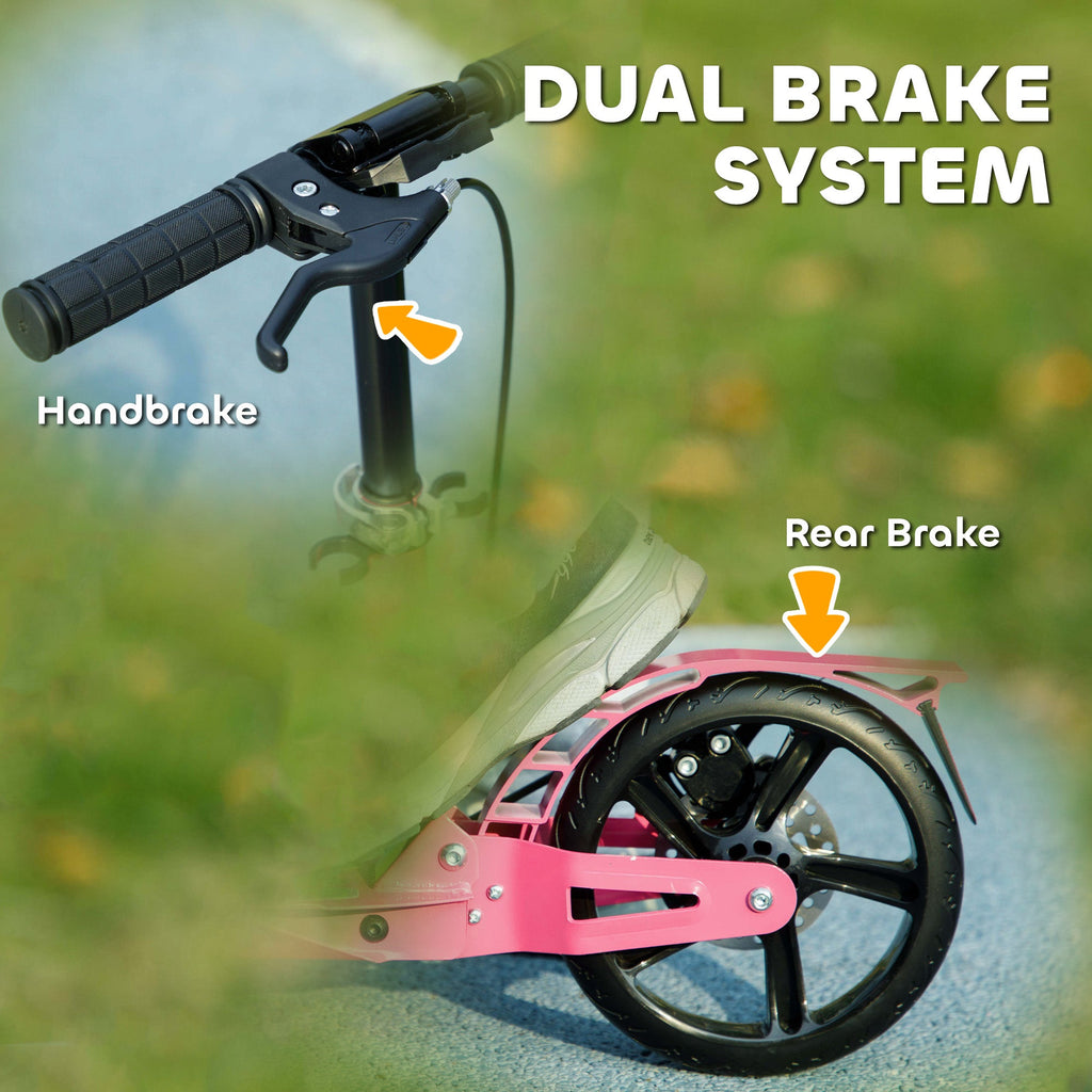 Pink kids kick scooter with dual brake system, rear wheel and handle close-up