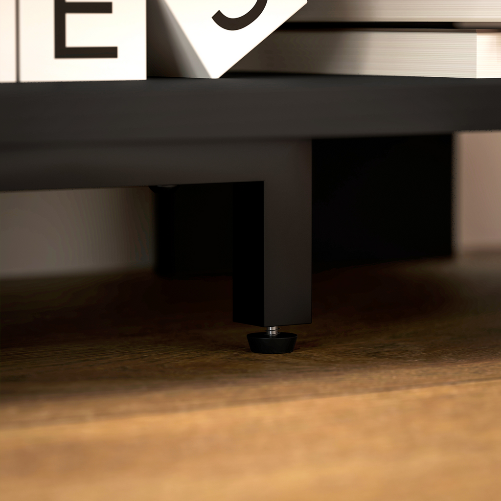 Underside view of a dark corner TV stand showing sturdy legs