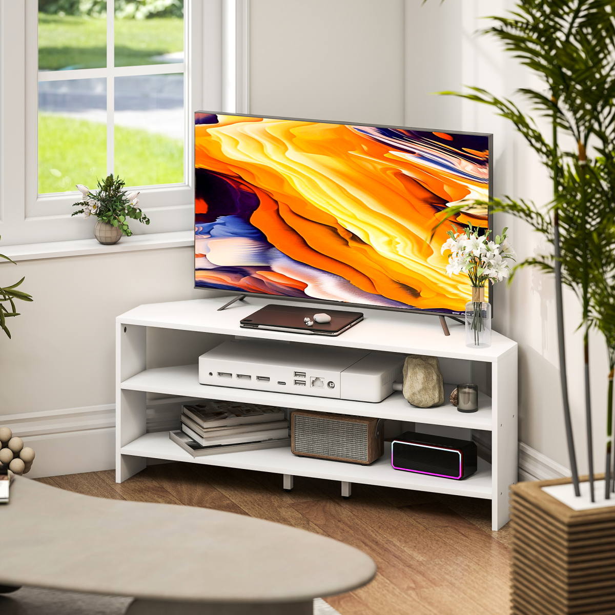 White corner TV stand with open shelves for devices and a media console