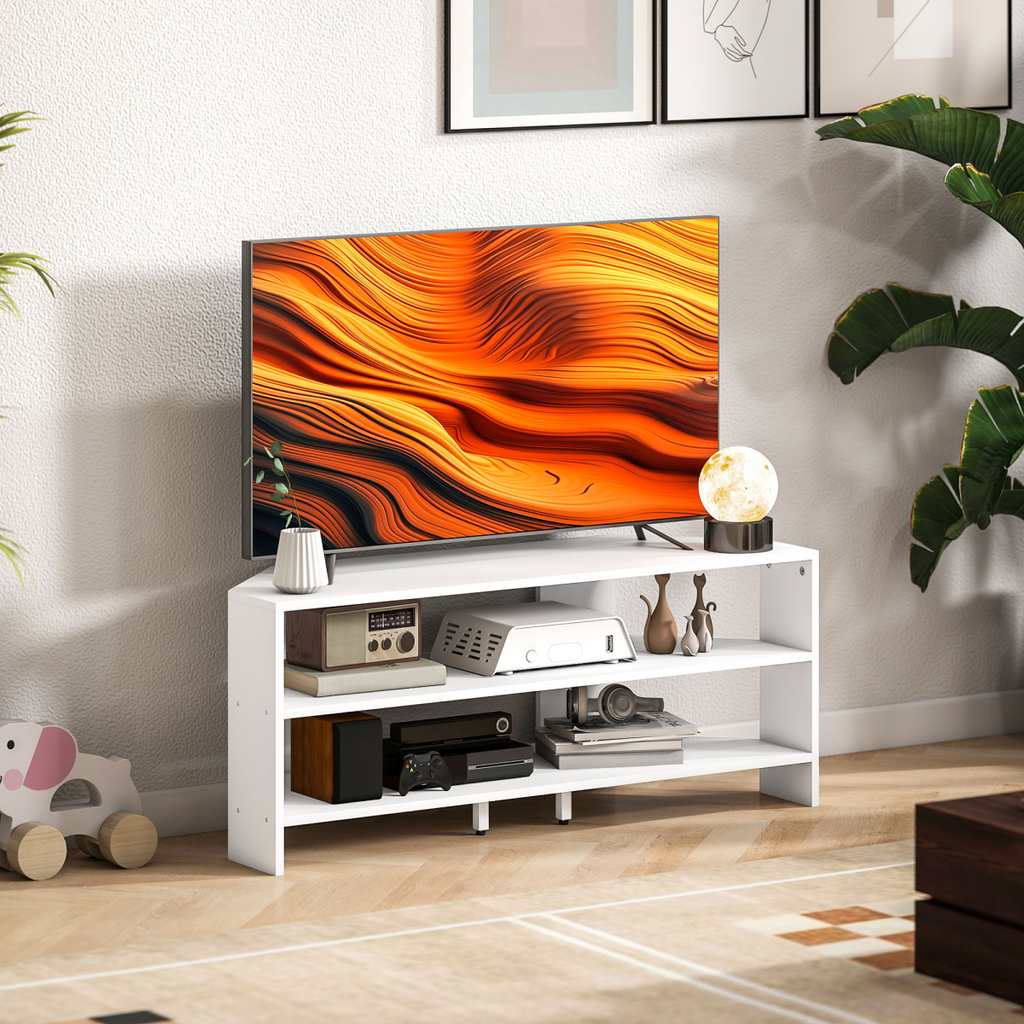White TV stand with open shelves for console, media devices, and storage bins