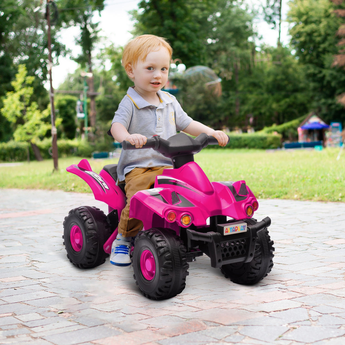 Pink kids electric quad bike with four rugged tires, front lights, and handlebar