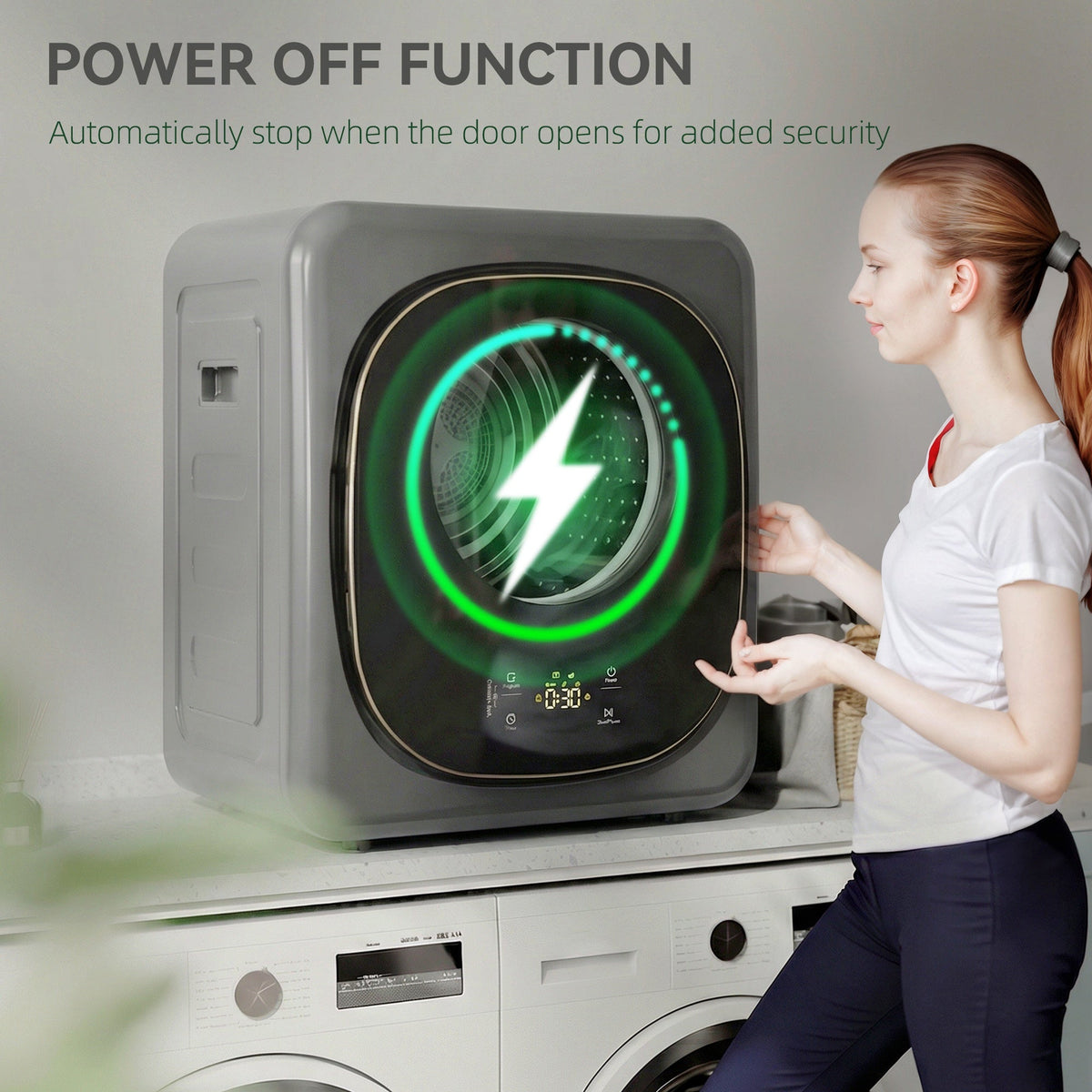 Grey front tumble dryer with green power-off icon shown on control panel.