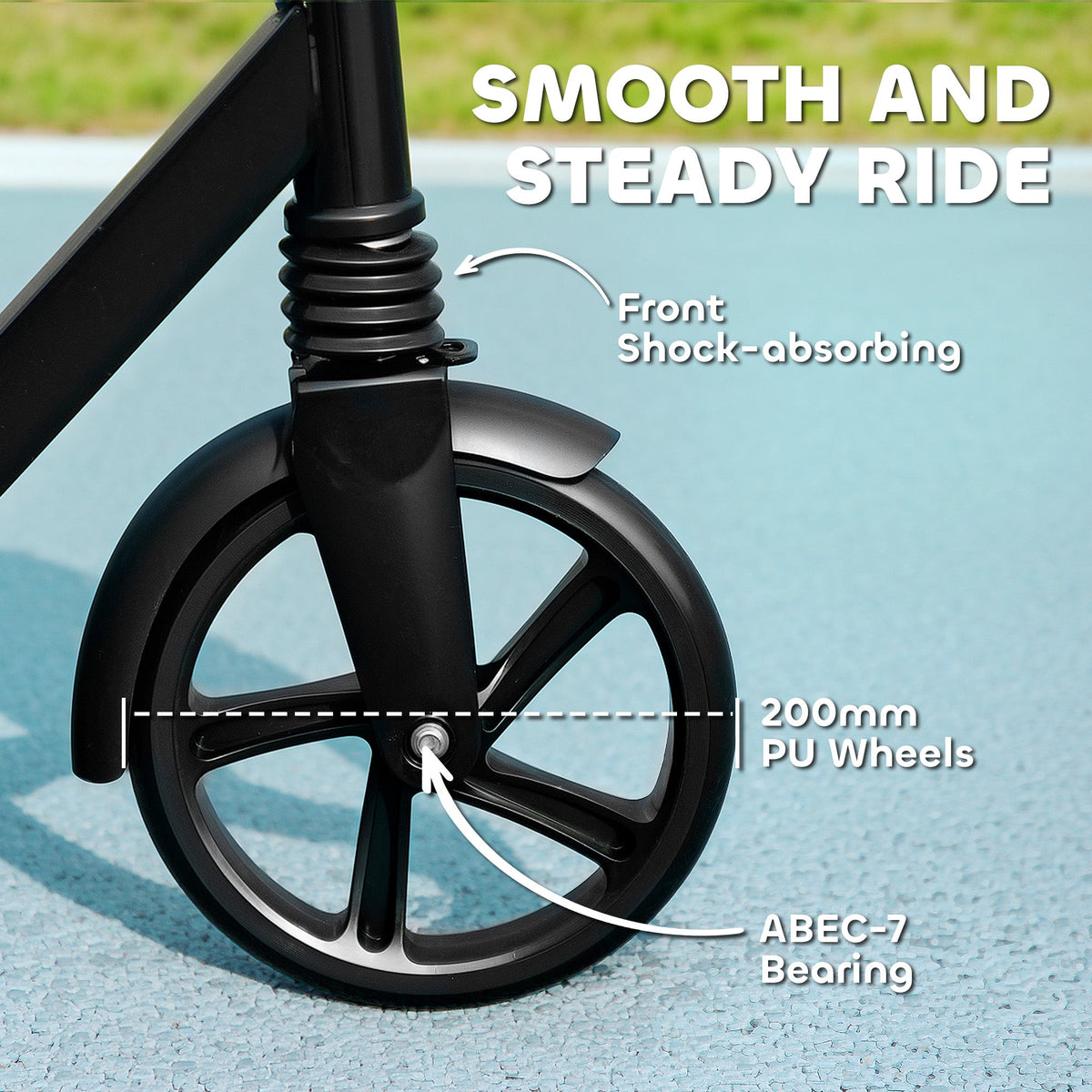 Front wheel and fork of black kick scooter with shock absorber