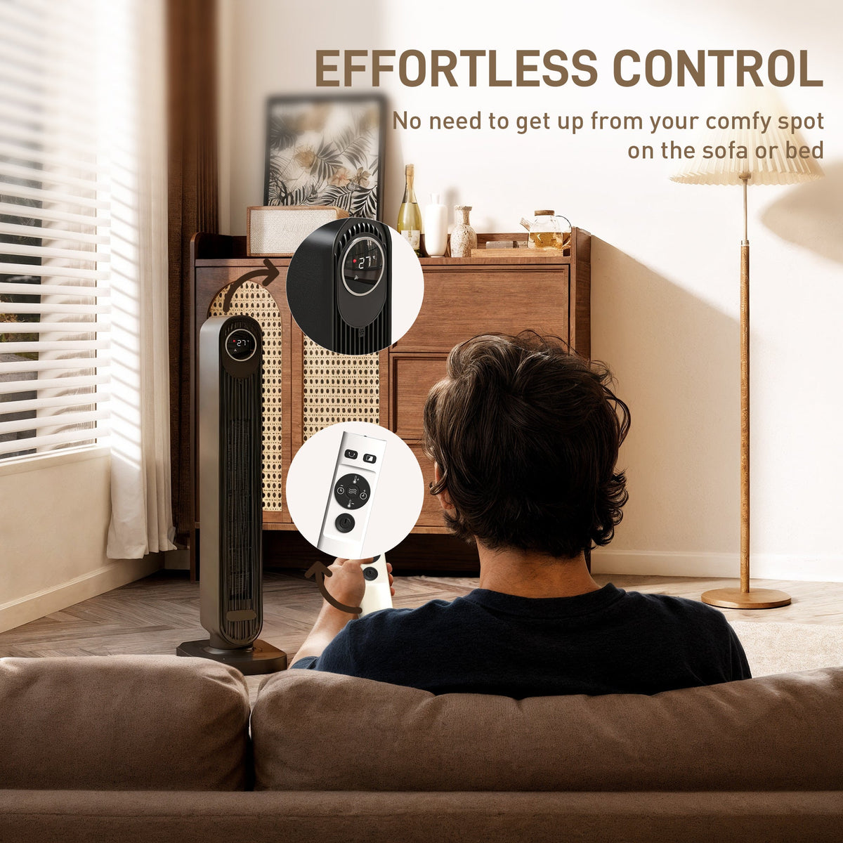 Black tower ceramic heater with fan and remote control beside it on a sofa.