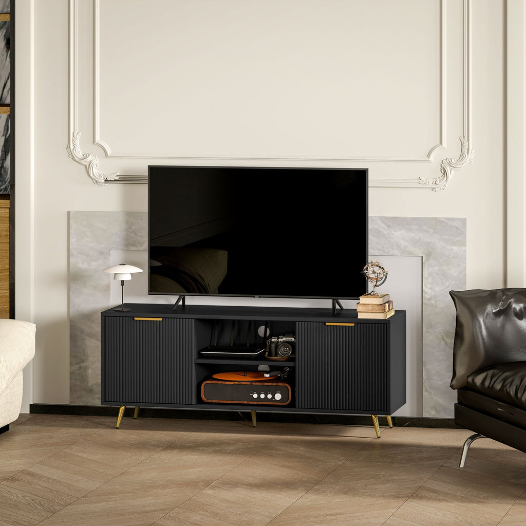 Black TV stand with ribbed doors, open center shelf, media console style with gold legs