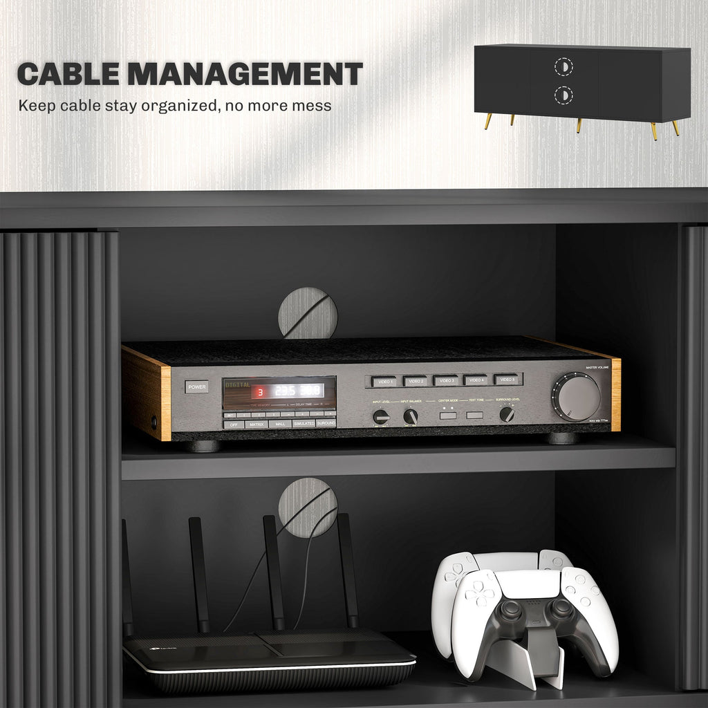Black TV stand interior with open shelves for media devices and game controller