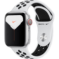 Apple Watch Series 6 smartwatch with silver case and white perforated Nike band, black screen.