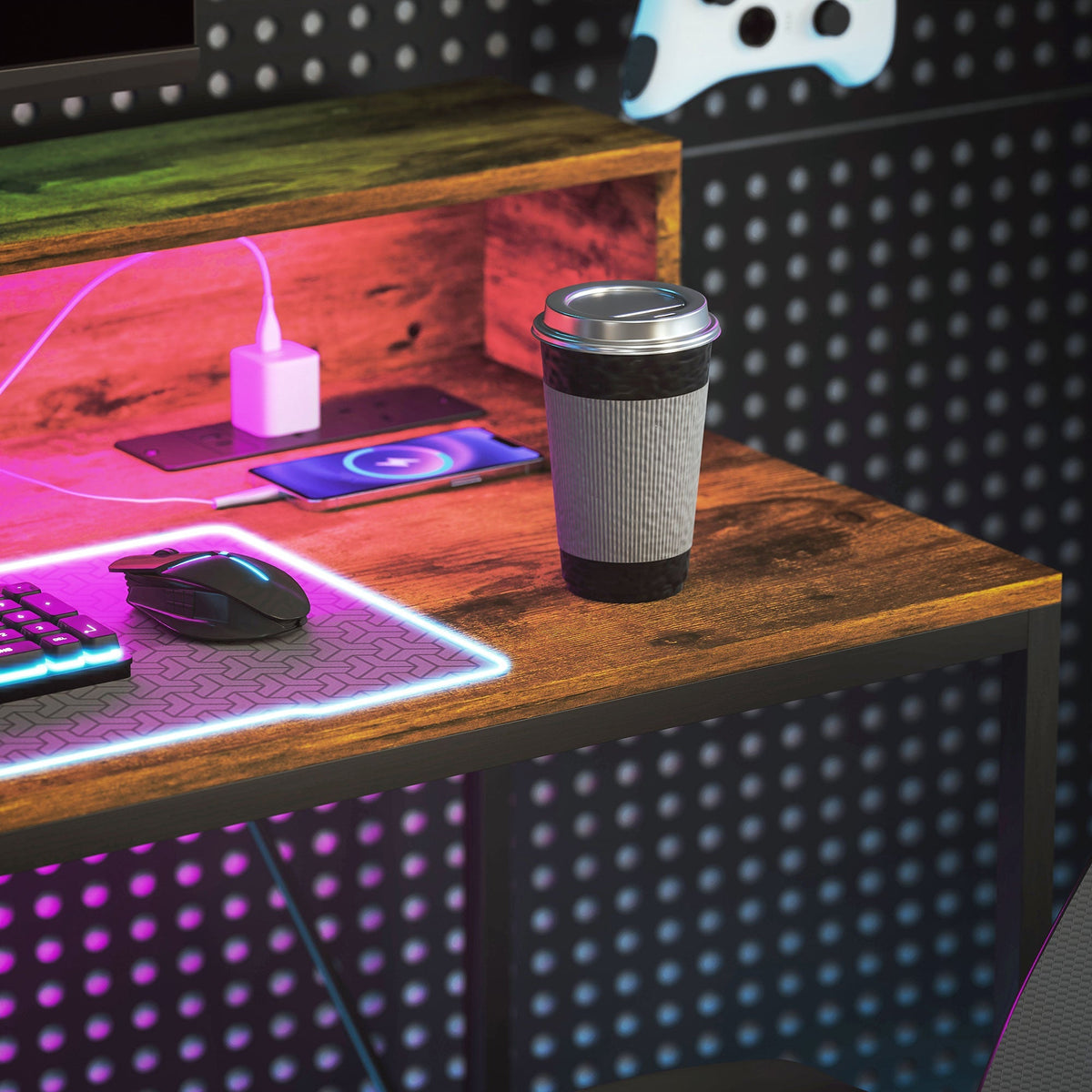 Corner of rustic brown desk with LED glow, phone on charging pad, and cup