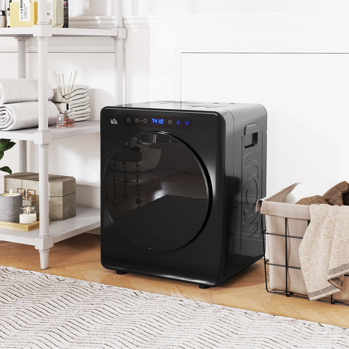Black compact tumble dryer with front door and circular glass window