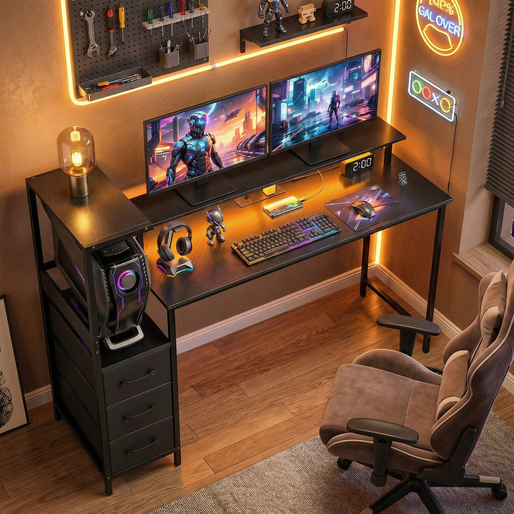 Black gaming desk with RGB lighted top, keyboard tray, and side tower storage drawers