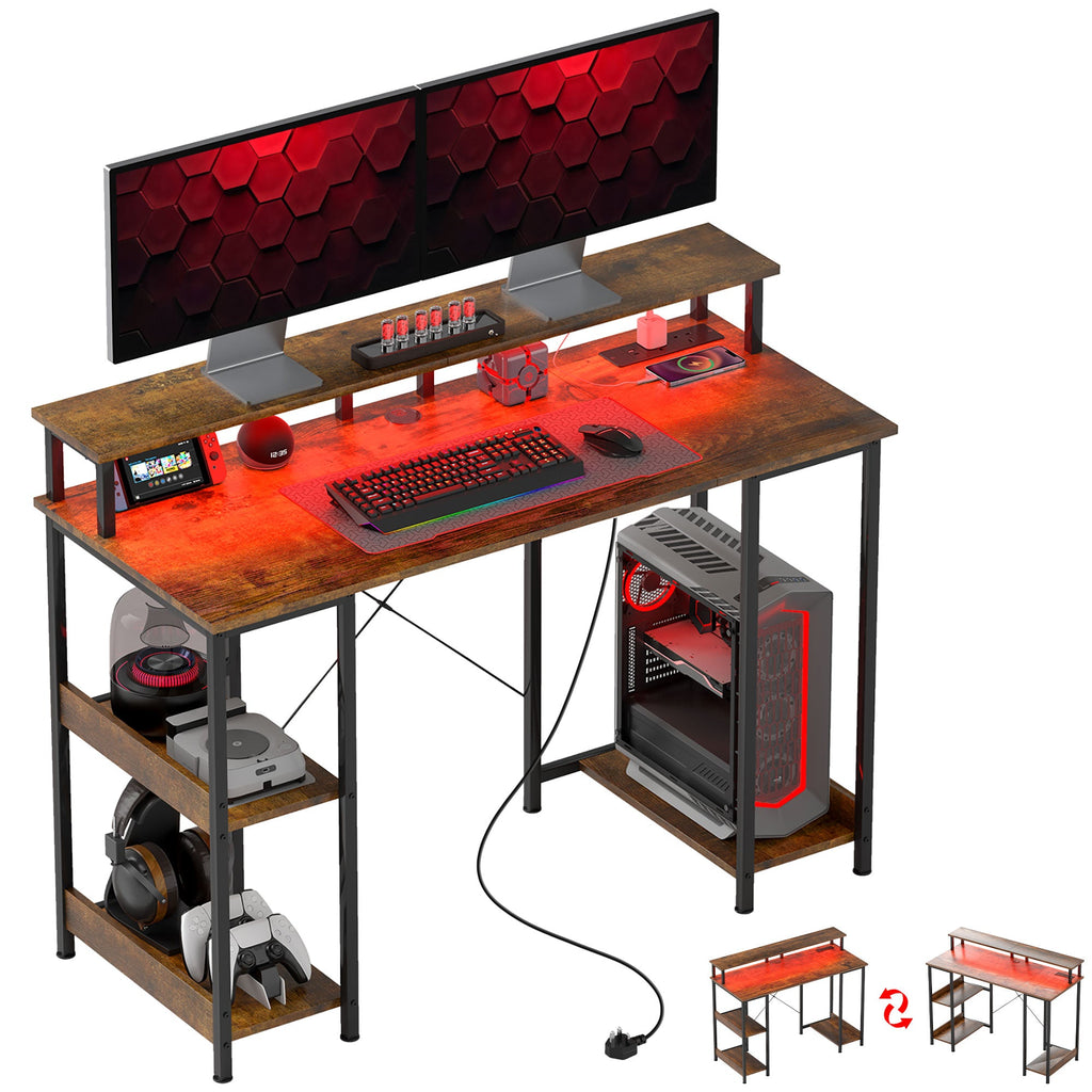 Rustic brown computer desk with LED-lit gaming setup and keyboard/mouse on top