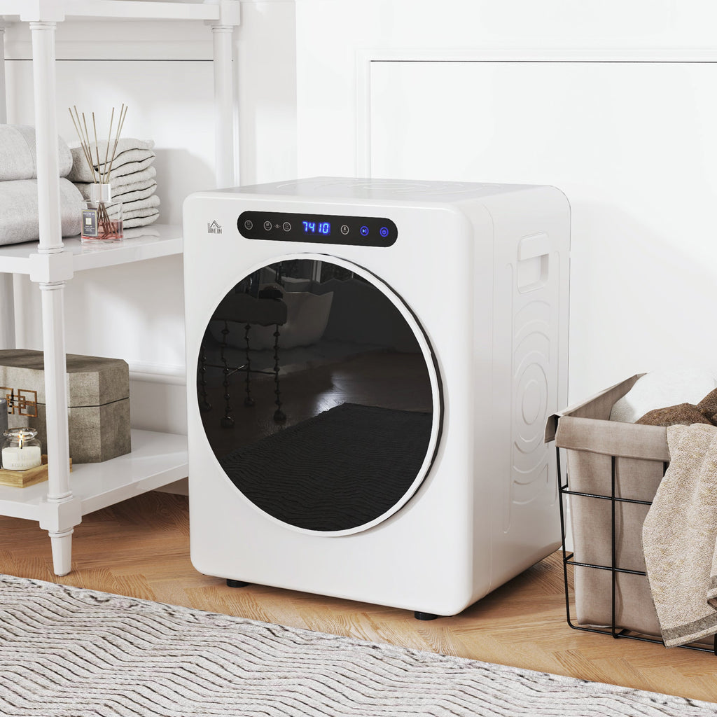 White compact front vented tumble dryer on feet with round door and top control panel