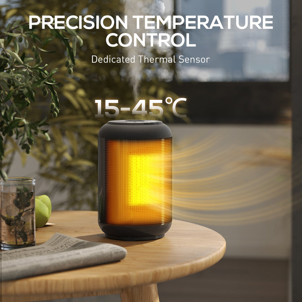Black ceramic electric heater on wooden table with glowing amber heating core