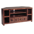Dark wood corner TV unit with open center shelf, two side cubbies, and four drawer doors