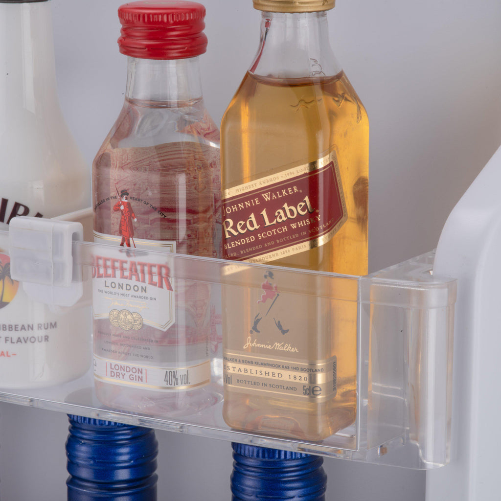 Mini bar fridge interior shelf with bottles and plastic ice bin compartments