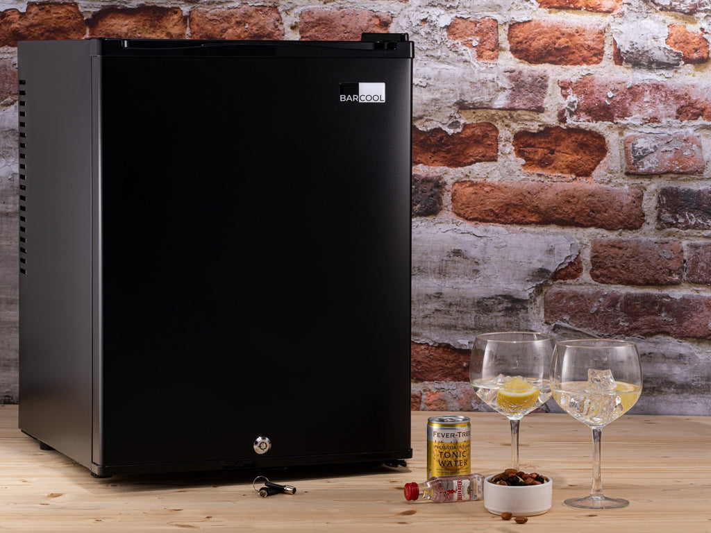 Black Barcool mini bar fridge, closed front with small front vent and logo