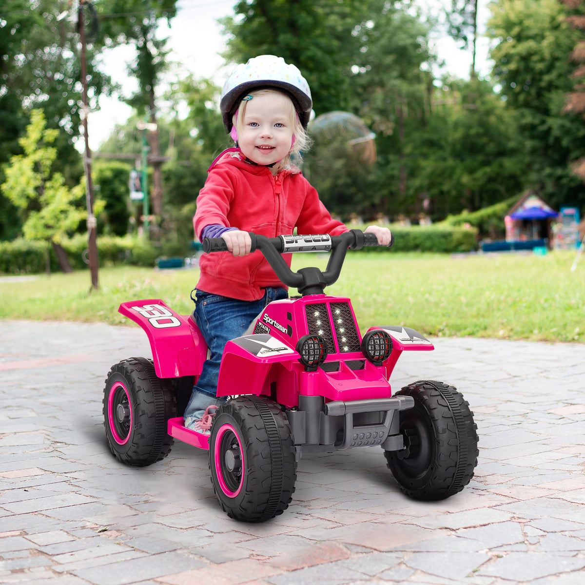 Pink kids electric quad bike with forward/backward handle controls and black wheels