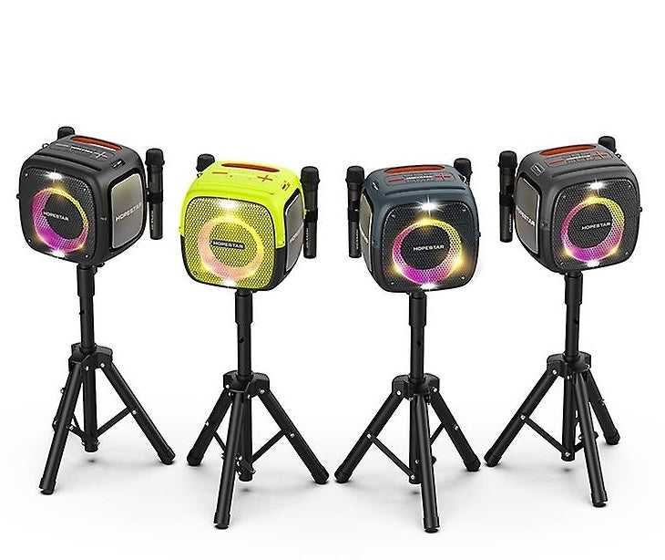 Four Hopestar Party One wireless speakers on black tripod stands with multicolor LED rings.