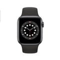 Apple Watch Series 6 44mm with black sport band, digital watch face on dark screen.