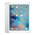 Silver iPad Pro 9.7-inch 256GB Wi‑Fi tablet showing app icons on the front screen
