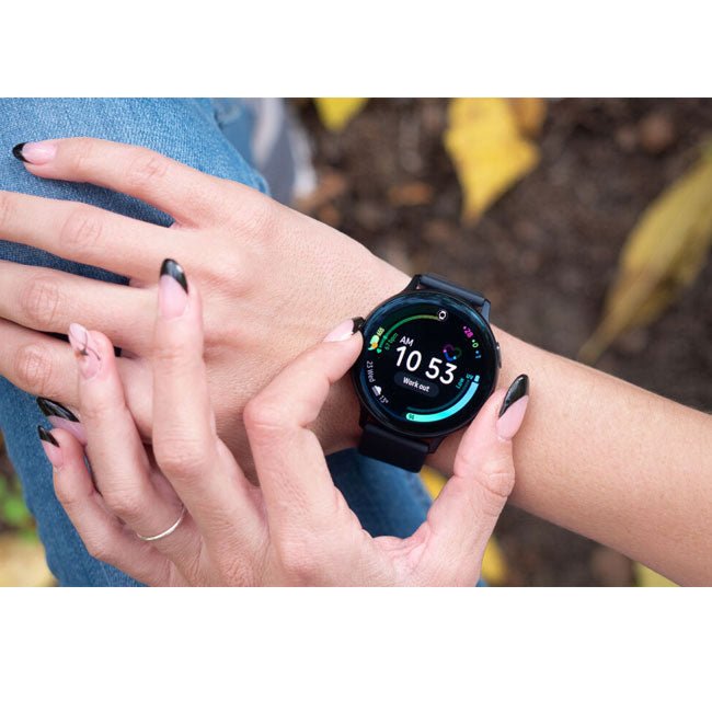 Refurbished smartwatch on wrist with dark strap and black round display