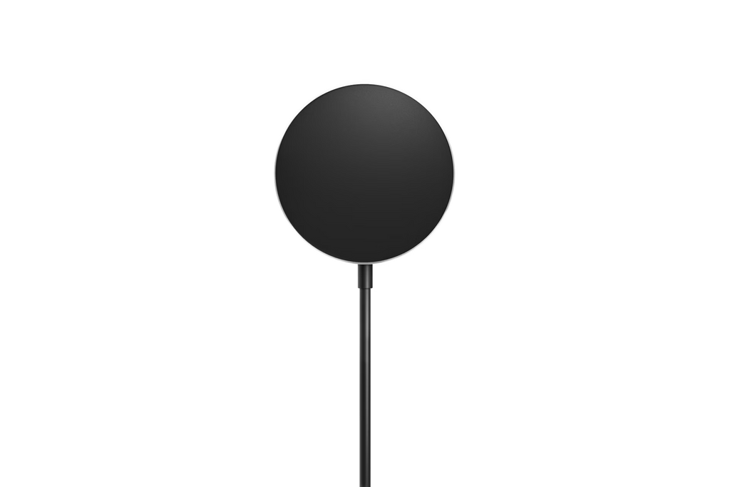 Black magnetic Qi2 wireless charger puck with USB cable