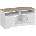 White TV stand with wood-look top, two open shelves, and two cabinet doors