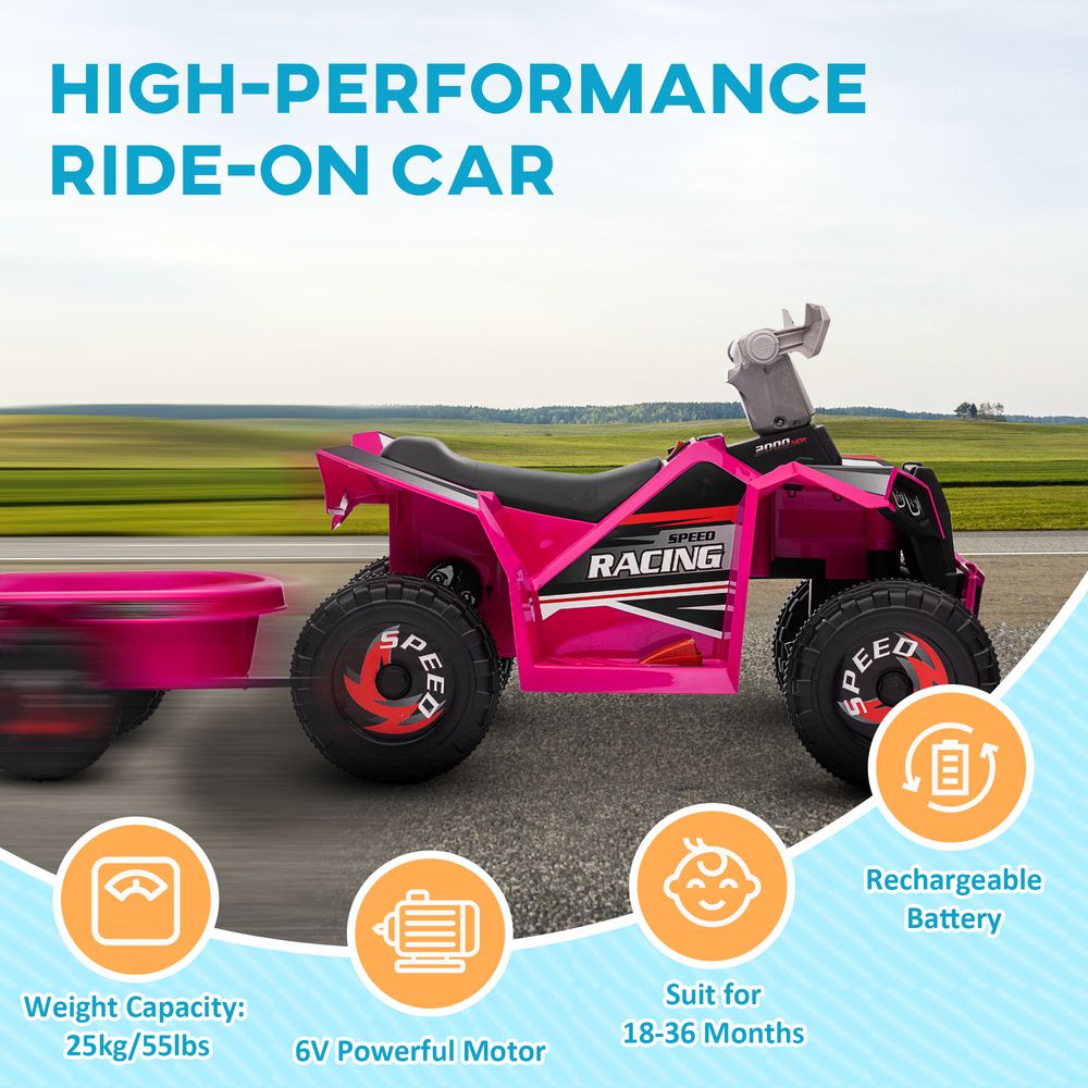 Pink electric ride-on car on paved path with side trailer