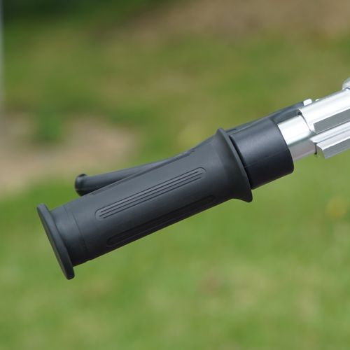 Close-up of the black rubber handle grip on a silver handlebar