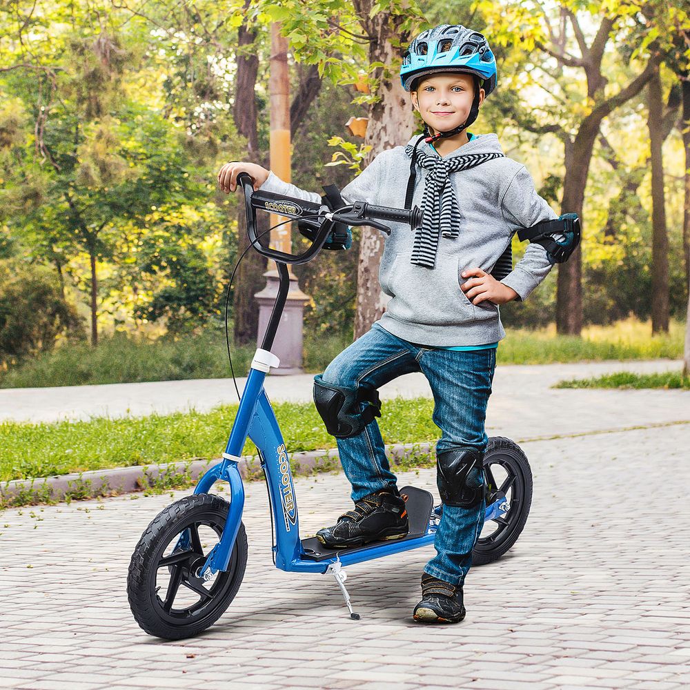 Blue kids stunt scooter with black handlebar grips and large EVA tires