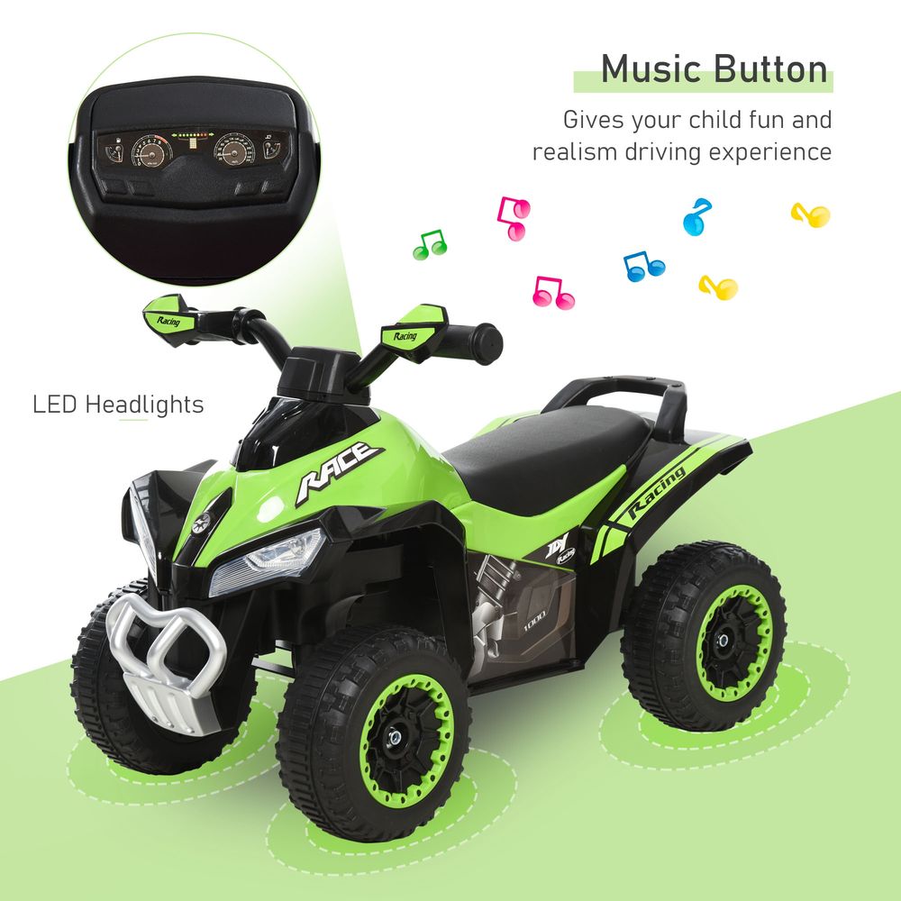 Green and black toddler ride-on quad car with LED headlights and dashboard control panel