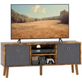 Modern TV cabinet with fabric side doors, open center shelf, and storage drawers, rustic brown